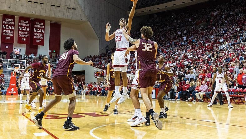 Nov 10, 2022; Bloomington, Indiana, USA; Indiana Hoosiers forward Trayce Jackson-Davis (23) shoots the ball while Bethune-Cookman Wildcats center Elijah Hulsewe (32) defends in the first half at Simon Skjodt Assembly Hall. Mandatory Credit: Trevor Ruszkowski-USA TODAY Sports