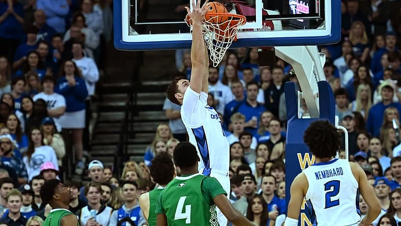 Nov 10, 2022; Omaha, Nebraska, USA; Creighton Bluejays center Ryan Kalkbrenner (11) dunks against the North Dakota Fighting Hawks during the first half at CHI Health Center Omaha. Mandatory Credit: Steven Branscombe-USA TODAY Sports