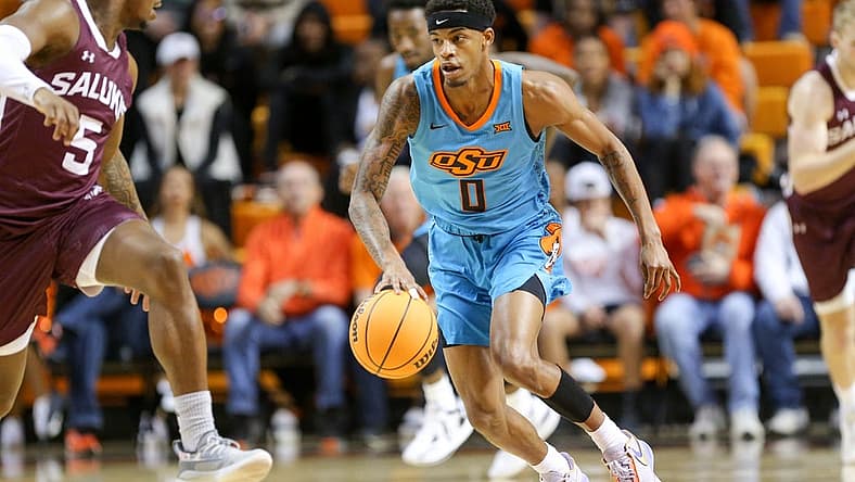 Oklahoma State guard Avery Anderson III (0) works his way up court during a college basketball game between the Oklahoma State Cowboys (OSU) and the Southern Illinois Salukis at Gallagher-Iba Arena in Stillwater, Okla., Thursday, Nov. 10, 2022.
Osu Vs Southern Illinois