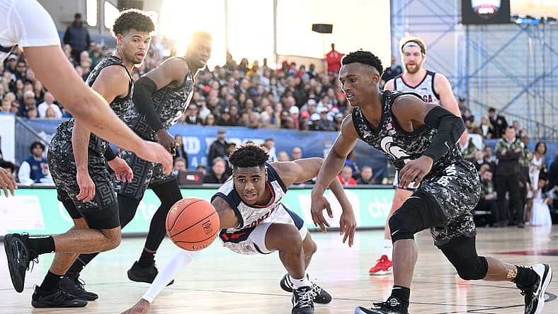 Nov 11, 2022; San Diego, California, US; Gonzaga Bulldogs guard Malachi Smith (13) dives for a loose ball during the first half against the Michigan State Spartans at USS Abraham Lincoln. Mandatory Credit: Orlando Ramirez-USA TODAY Sports