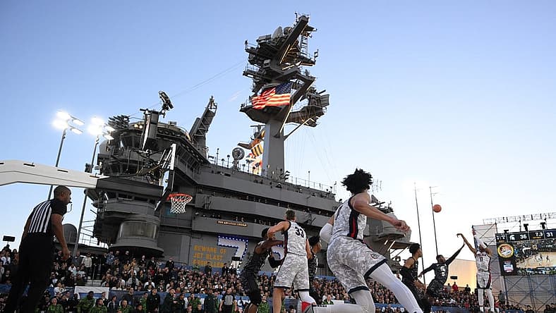 Nov 11, 2022; San Diego, California, US; Gonzaga Bulldogs guard Nolan Hickman (11) shoots the ball over Michigan State Spartans guard Trejuan Holloman (5) during the first half at USS Abraham Lincoln. Mandatory Credit: Orlando Ramirez-USA TODAY Sports