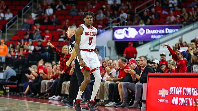 Nov 11, 2022; Raleigh, North Carolina, USA; North Carolina State Wolfpack guard Terquavion Smith (0) celebrates a point during the first half against Campbell Fighting Camels at PNC Arena. Mandatory Credit: Jaylynn Nash-USA TODAY Sports