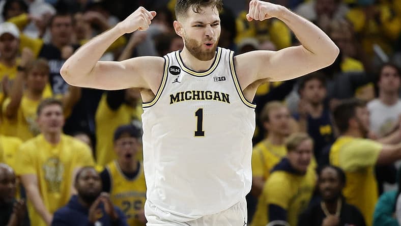 Nov 11, 2022; Detroit, Michigan, USA;  Michigan Wolverines center Hunter Dickinson (1) celebrates during the second half against the Eastern Michigan Eagles at Little Caesars Arena. Mandatory Credit: Rick Osentoski-USA TODAY Sports