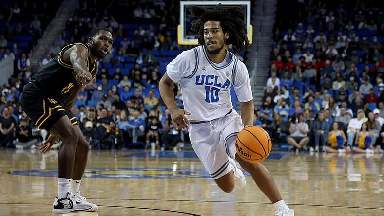 Nov 11, 2022; Los Angeles, California, USA;  UCLA Bruins guard Tyger Campbell (10) dribbles a ball against Long Beach State Beach during the first half at Pauley Pavilion presented by Wescom. Mandatory Credit: Kiyoshi Mio-USA TODAY Sports