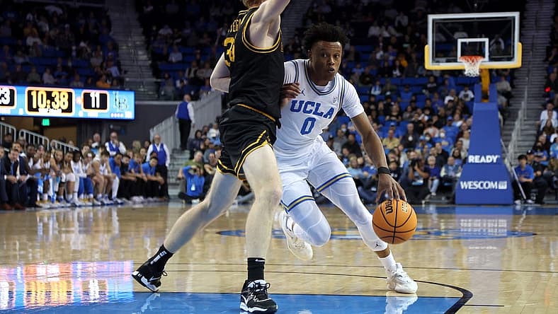 Nov 11, 2022; Los Angeles, California, USA; UCLA Bruins guard Jaylen Clark (0) drives to the basket during the first half against the Long Beach State Beach at Pauley Pavilion presented by Wescom. Mandatory Credit: Kiyoshi Mio-USA TODAY Sports