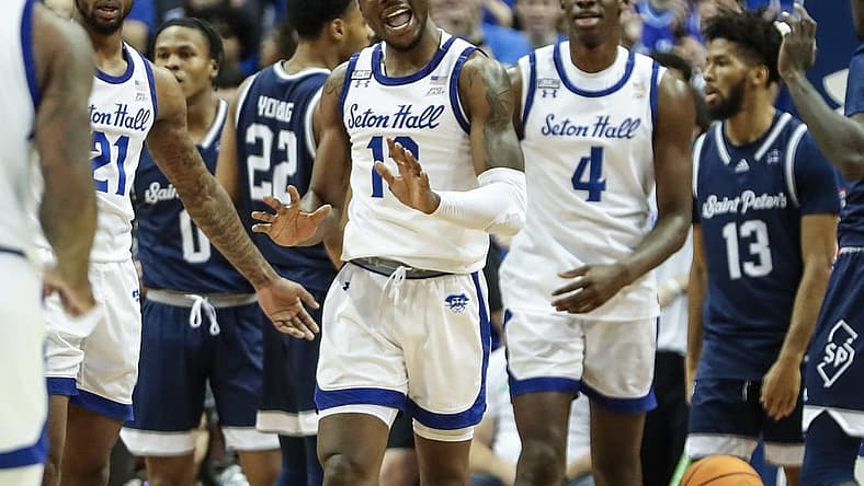 Nov 12, 2022; Newark, New Jersey, USA;  Seton Hall Pirates forward KC Ndefo (13) reacts after scoring and being fouled in the first half against the St. Peter's Peacocks on at Prudential Center. Mandatory Credit: Wendell Cruz-USA TODAY Sports
