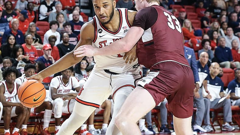 Nov 12, 2022; Queens, New York, USA; St. John's Red Storm center Joel Soriano (11) posts up against Lafayette Leopards forward Leo O'Boyle (33) in the second half at Carnesecca Arena. Mandatory Credit: Wendell Cruz-USA TODAY Sports