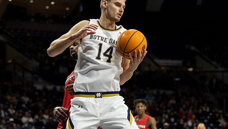 Notre Dame forward Nate Laszewski (14) grabs a rebound during the Youngstown State-Notre Dame NCAA Men's basketball game on Sunday, November 13, 2022, at Purcell Pavilion in South Bend, Indiana.

Youngstown State Vs Notre Dame