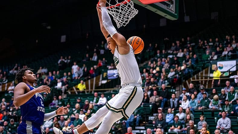Colorado State senior guard John Tonje (1) finishes a reverse dunk against Weber State at Moby Arena on Monday Nov. 14, 2022.
Csu Bball Vs Weber State