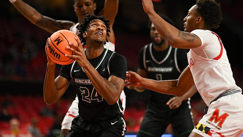 Nov 15, 2022; College Park, Maryland, USA;  Binghamton Bearcats guard Masud Stewart (4) looks to shoot as Maryland Terrapins guard Jahmir Young (1) defends during the first half at Xfinity Center. Mandatory Credit: Tommy Gilligan-USA TODAY Sports