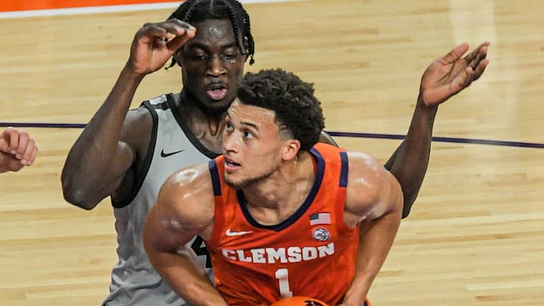 Clemson junior guard Chase Hunter (1) shoots near USC Upstate forward Sent Ndiaye (45) during the first half at Littlejohn Coliseum Tuesday, November 15, 2022.
Ncaa Acc Clemson Basketball Vs Usc Upstate