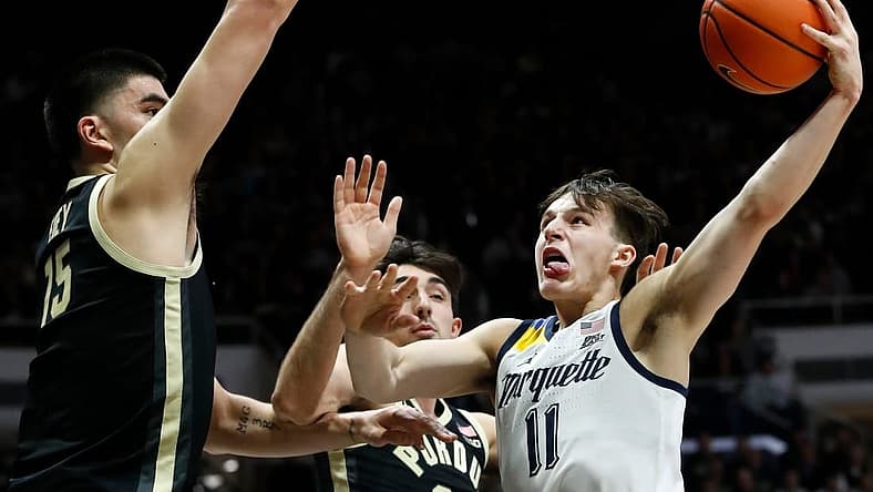 Marquette Golden Eagles guard Tyler Kolek (11) goes up for a shot during the NCAA men s basketball game against the Purdue Boilermakers, Tuesday, Nov. 15, 2022, at Mackey Arena in West Lafayette, Ind.
Purduemarquettembb111522 Am34400