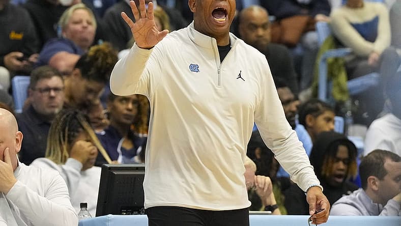 Nov 15, 2022; Chapel Hill, North Carolina, USA; North Carolina Tar Heels head coach Hubert Davis reacts against the Gardner Webb Runnin Bulldogs during the first half at Dean E. Smith Center. Mandatory Credit: James Guillory-USA TODAY Sports