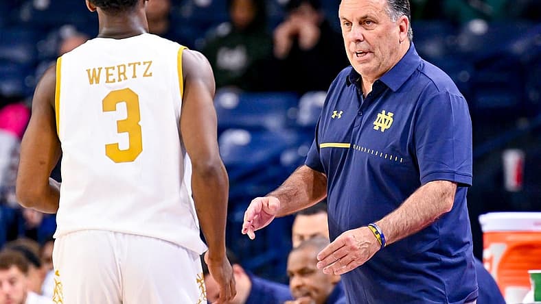 Nov 16, 2022; South Bend, Indiana, USA; Notre Dame Fighting Irish head coach Mike Brey talks to guard Trey Wertz (3) in the second half against the Southern Indiana Screaming Eagles at the Purcell Pavilion. Mandatory Credit: Matt Cashore-USA TODAY Sports