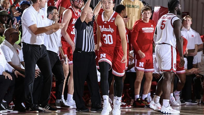 Nov 17, 2022; Queens, New York, USA; Nebraska Cornhuskers guard Keisei Tominaga (30) celebrates after making a three point in the second half against the Nebraska Cornhuskers at Carnesecca Arena. Mandatory Credit: Wendell Cruz-USA TODAY Sports