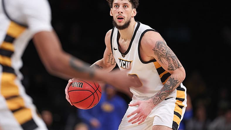 Nov 17, 2022; Brooklyn, New York, USA; (Editors Notes: Caption Correction) Virginia Commonwealth Rams forward Brandon Johns Jr. (30) dribbles during the second half against the Pittsburgh Panthers at Barclays Center. Mandatory Credit: Vincent Carchietta-USA TODAY Sports