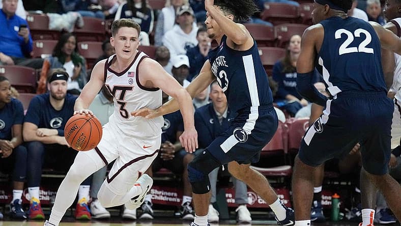 Nov 18, 2022; Charleston, South Carolina, USA; Virginia Tech Hokies guard Sean Pedulla (3) gets around Penn State Nittany Lions guard Dallion Johnson (23) in the first half at TD Arena. Mandatory Credit: David Yeazell-USA TODAY Sports