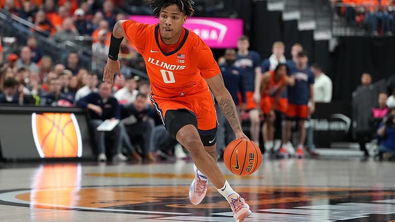 Nov 18, 2022; Las Vegas, Nevada, USA; Illinois Fighting Illini guard Terrence Shannon Jr. (0) dribbles against the UCLA Bruins during the first half at T-Mobile Arena. Mandatory Credit: Stephen R. Sylvanie-USA TODAY Sports