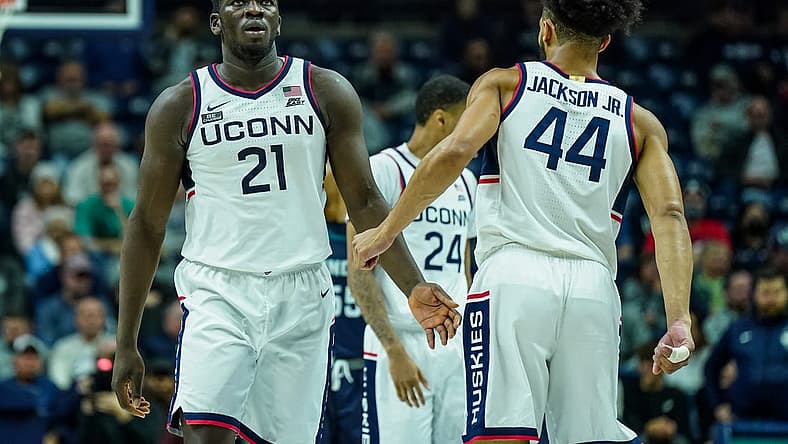Nov 18, 2022; Storrs, Connecticut, USA; Connecticut Huskies forward Adama Sanogo (21) and guard Andre Jackson Jr. (44) react after a play against the North Carolina-Wilmington Seahawks in the second half at Harry A. Gampel Pavilion. Mandatory Credit: David Butler II-USA TODAY Sports