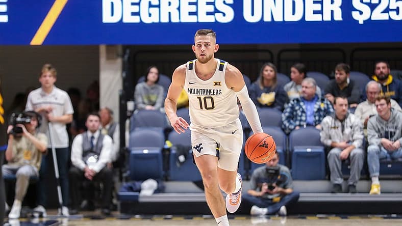 Nov 15, 2022; Morgantown, West Virginia, USA; West Virginia Mountaineers guard Erik Stevenson (10) dribbles the ball during the second half against the Morehead State Eagles at WVU Coliseum. Mandatory Credit: Ben Queen-USA TODAY Sports