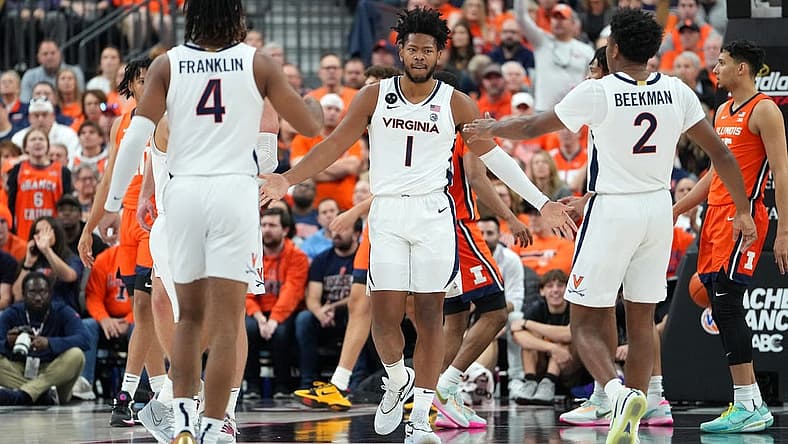 Nov 20, 2022; Las Vegas, Nevada, USA; Virginia Cavaliers forward Jayden Gardner (1) celebrates with Virginia Cavaliers guard Armaan Franklin (4) and Virginia Cavaliers guard Reece Beekman (2) after making a play against the Illinois Fighting Illini during the first half at T-Mobile Arena. Mandatory Credit: Stephen R. Sylvanie-USA TODAY Sports