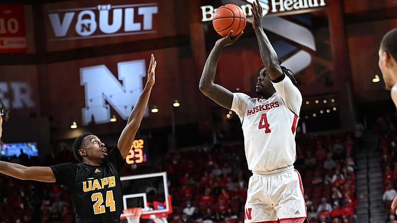 Nov 20, 2022; Lincoln, Nebraska, USA; Nebraska Cornhuskers forward Juwan Gary (4) attempts a three point basket against Arkansas-Pine Bluff Golden Lions guard AC Curry (24) during the first half at Pinnacle Bank Arena. Mandatory Credit: Steven Branscombe-USA TODAY Sports