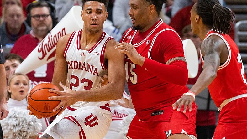 Nov 20, 2022; Indianapolis, Indiana, USA; Indiana Hoosiers forward Trayce Jackson-Davis (23) dribbles the ball while Miami (Oh) Redhawks forward Anderson Mirambeaux (45) defends in the first half at Gainbridge Fieldhouse. Mandatory Credit: Trevor Ruszkowski-USA TODAY Sports