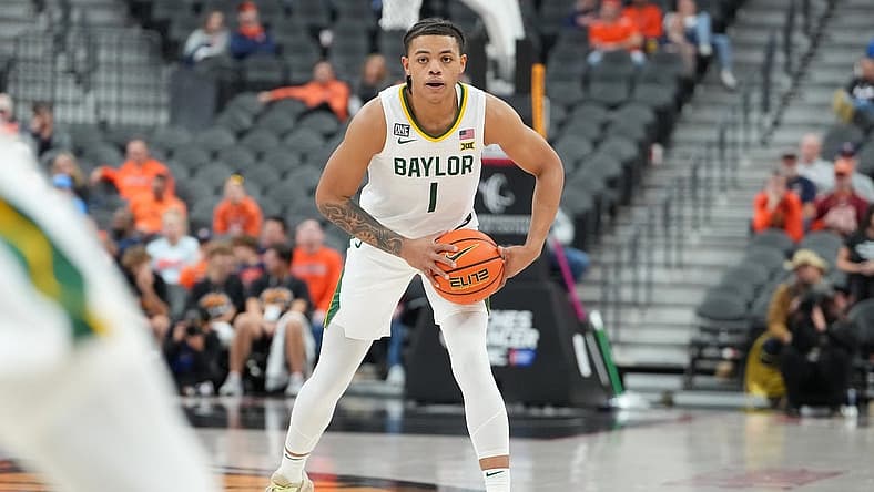 Nov 20, 2022; Las Vegas, Nevada, USA; Baylor Bears guard Keyonte George (1) looks for an open team mate against the Baylor Bears during the second half at T-Mobile Arena. Mandatory Credit: Stephen R. Sylvanie-USA TODAY Sports