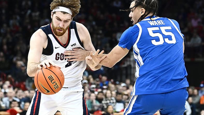 Nov 20, 2022; Spokane, Washington, USA; Gonzaga Bulldogs forward Drew Timme (2) is fouled on the drive by Kentucky Wildcats forward Lance Ware (55) in the first half at Spokane Arena. Mandatory Credit: James Snook-USA TODAY Sports