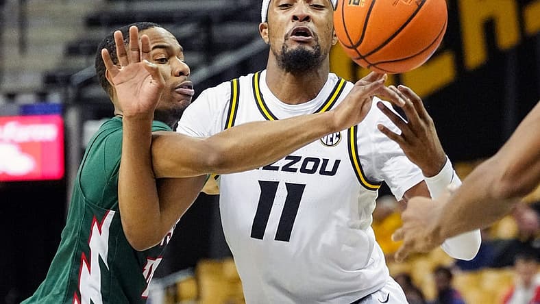 Nov 20, 2022; Columbia, Missouri, USA; Mississippi Valley State Delta Devils guard Kadar Waller (3) knocks the ball away from Missouri Tigers guard Isiaih Mosley (11) during the second half at Mizzou Arena. Mandatory Credit: Jay Biggerstaff-USA TODAY Sports