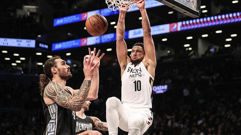 Nov 20, 2022; Brooklyn, New York, USA; Brooklyn Nets guard Ben Simmons (10) dunks on Memphis Grizzlies center Steven Adams (4) in the third quarter at Barclays Center. Mandatory Credit: Wendell Cruz-USA TODAY Sports