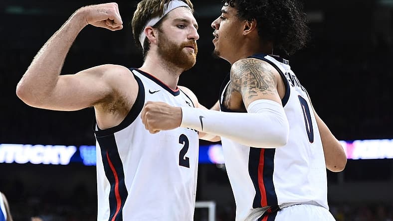 Nov 20, 2022; Spokane, Washington, USA; Gonzaga Bulldogs forward Drew Timme (2) and Gonzaga Bulldogs guard Julian Strawther (0) celebrate after a play against the Kentucky Wildcats in the second half at Spokane Arena. Gonzaga won 88-72. Mandatory Credit: James Snook-USA TODAY Sports