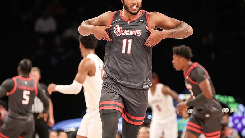 Nov 21, 2022; Brooklyn, New York, USA; St. John's Red Storm center Joel Soriano (11) celebrates after scoring in the first half against the Temple Owls at Barclays Center. Mandatory Credit: Wendell Cruz-USA TODAY Sports