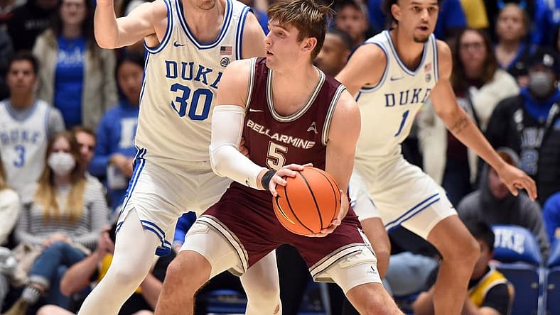 Nov 21, 2022; Durham, North Carolina, USA; Bellarmine Knights guard Peter Suter (5) controls the ball against Duke Blue Devils center Kyle Filipowski (30) during the second half at Cameron Indoor Stadium. Mandatory Credit: Rob Kinnan-USA TODAY Sports