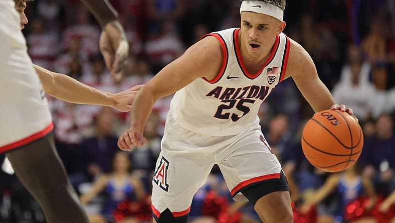 Nov 17, 2022; Tucson, Arizona, USA; Arizona Wildcats guard Kerr Kriisa (25) dribbles up the court to the basket at McKale Center. Mandatory Credit: David Cruz-USA TODAY Sports