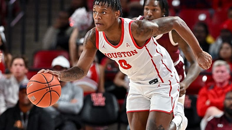 Nov 16, 2022; Houston, Texas, USA; Houston Cougars guard Marcus Sasser (0) brings the ball up court during the first half against the Texas Southern Tigers at Fertitta Center. Mandatory Credit: Maria Lysaker-USA TODAY Sports