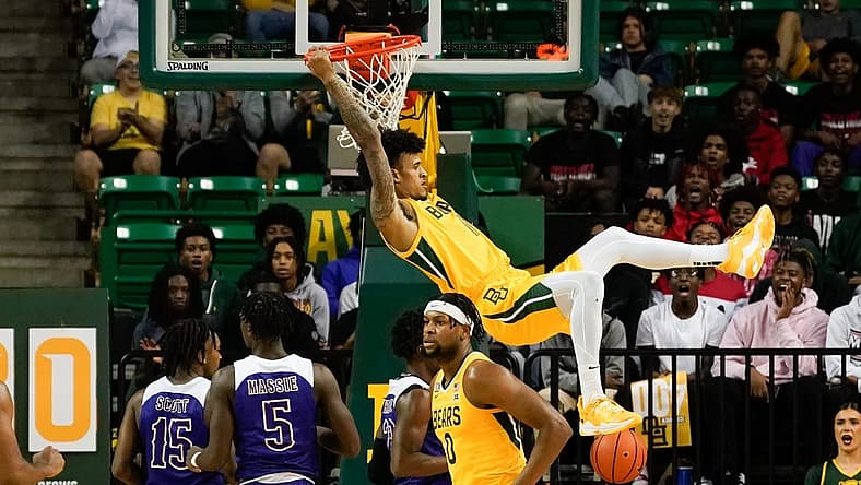 Nov 23, 2022; Waco, Texas, USA; Baylor Bears forward Jalen Bridges (11) dunks the ball against the McNeese State Cowboys during the first half at Ferrell Center. Mandatory Credit: Chris Jones-USA TODAY Sports