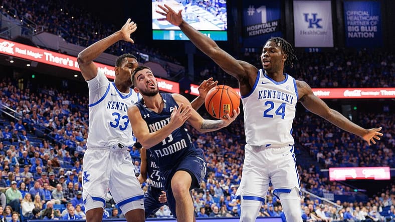 Nov 23, 2022; Lexington, Kentucky, USA; North Florida Ospreys guard Jose Placer (15) goes to the basket during the first half against the Kentucky Wildcats at Rupp Arena at Central Bank Center. Mandatory Credit: Jordan Prather-USA TODAY Sports