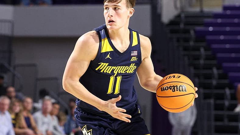 Nov 23, 2022; Fort Myers, Florida, USA; Marquette Golden Eagles guard Tyler Kolek (11) controls the ball against the Georgia Tech Yellow Jackets in the first half during the Fort Myers Tip-Off Beach Division third place game at Suncoast Credit Union Arena. Mandatory Credit: Nathan Ray Seebeck-USA TODAY Sports