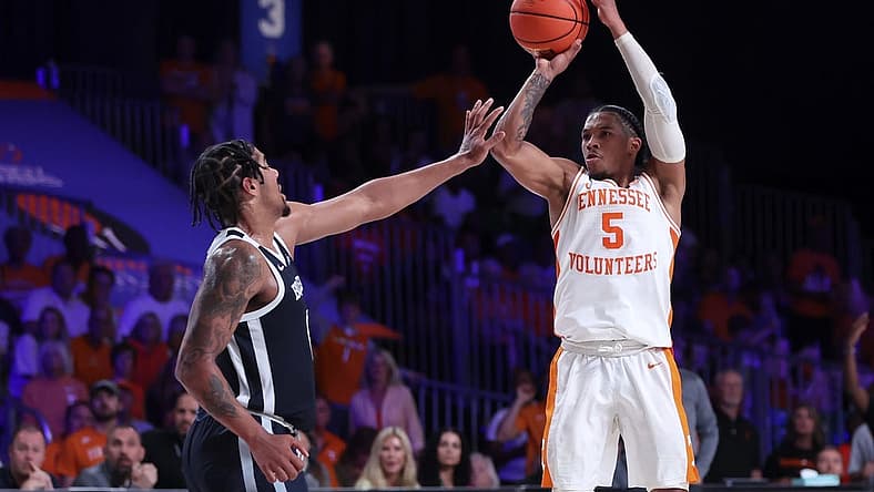 Nov 23, 2022; Paradise Island, BAHAMAS; Tennessee Volunteers guard Zakai Zeigler (5) shoots over Butler Bulldogs forward D.J. Hughes (0) during the first half at Imperial Arena. Mandatory Credit: Kevin Jairaj-USA TODAY Sports