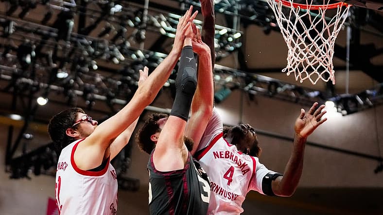Nov 24, 2022; Orlando, Florida, USA; Nebraska Cornhuskers forward Juwan Gary (4) blocks Oklahoma Sooners forward Tanner Groves (35) shot during the second half at State Farm Field House. Mandatory Credit: Rich Storry-USA TODAY Sports