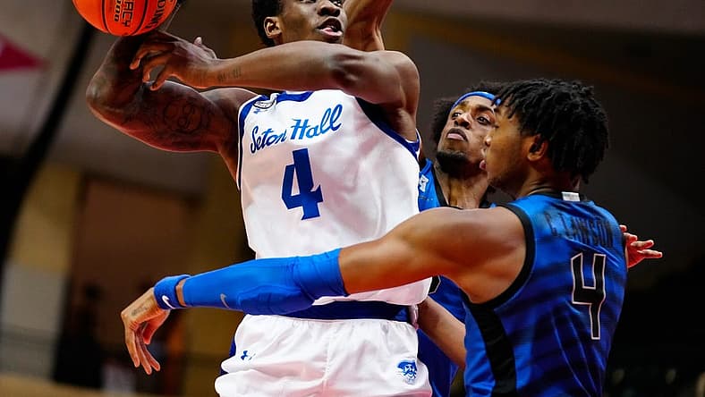 Nov 24, 2022; Orlando, Florida, USA; Seton Hall Pirates forward Tyrese Samuel (4) is defended by Memphis Tigers forward Chandler Lawson (4) during the second half at ESPN Wide World of Sports. Mandatory Credit: Rich Storry-USA TODAY Sports
