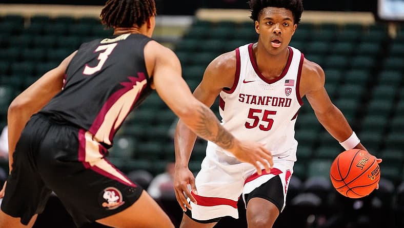 Nov 25, 2022; Orlando, FL, USA; Stanford Cardinal forward Harrison Ingram (55) dribbles the ball up the court against the Florida State Seminoles during the first half at ESPN Wide World of Sports. Mandatory Credit: Rich Storry-USA TODAY Sports
