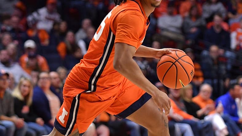 Nov 25, 2022; Champaign, Illinois, USA; Illinois Fighting Illini guard Skyy Clark (55) drives the ball up court during the first half against the Lindenwood Lions at State Farm Center. Mandatory Credit: Ron Johnson-USA TODAY Sports