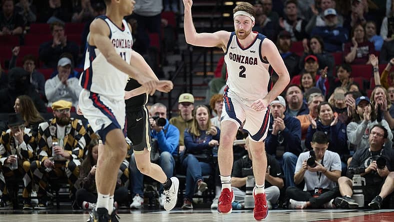 Nov 25, 2022; Portland, Oregon, USA; Gonzaga Bulldogs forward Drew Timme (2) celebrates after scoring a basket during the second half against the Purdue Boilermakers at Moda Center. Purdue won the game 84-66. Mandatory Credit: Troy Wayrynen-USA TODAY Sports