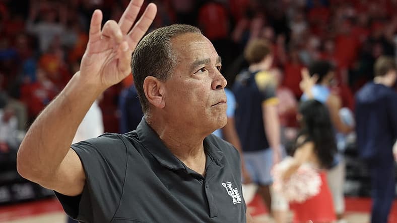 Nov 26, 2022; Houston, Texas, USA; Houston Cougars head coach Kelvin Sampson stands for the school song after defeating the Kent State Golden Flashes at the Fertitta Center. Mandatory Credit: Thomas Shea-USA TODAY Sports