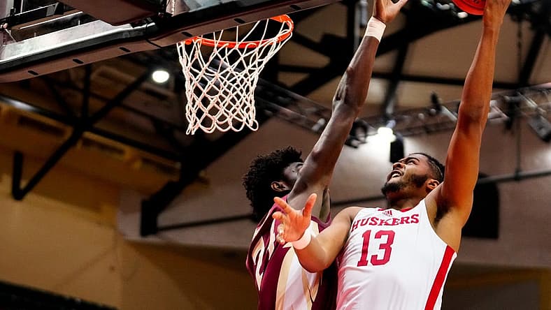 Nov 27, 2022; Orlando, FL, USA; Nebraska Cornhuskers forward Derrick Walker (13) shoots against Florida State Seminoles center Naheem McLeod (24) during the second half at ESPN Wide World of Sports. Mandatory Credit: Rich Storry-USA TODAY Sports