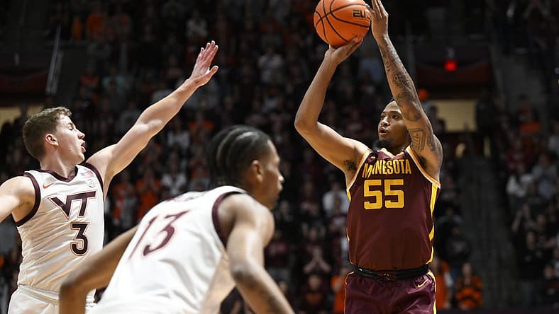 Nov 28, 2022; Blacksburg, Virginia, USA; Minnesota Golden Gophers guard Ta'lon Cooper (55) shoots over Virginia Tech Hokies guard Sean Pedulla (3) in the first half at Cassell Coliseum. Mandatory Credit: Lee Luther Jr.-USA TODAY Sports