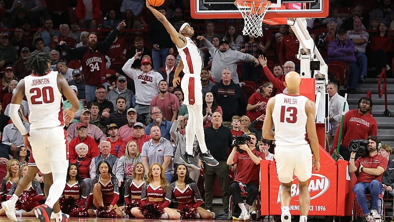 Nov 28, 2022; Fayetteville, Arkansas, USA; Arkansas Razorbacks guard Ricky Council IV (1) dunks the ball in the first half against the Troy Trojans at Bud Walton Arena. Mandatory Credit: Nelson Chenault-USA TODAY Sports