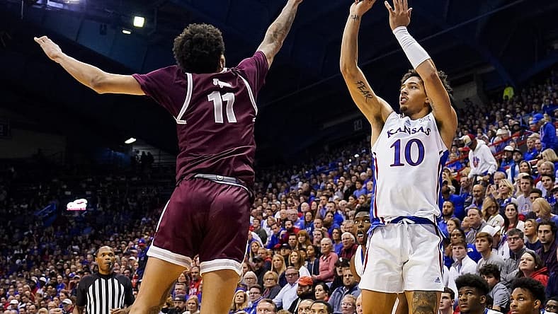 Nov 28, 2022; Lawrence, Kansas, USA; Kansas Jayhawks forward Jalen Wilson (10) shoots over Texas Southern Tigers guard Jordan Gilliam (11) during the second half at Allen Fieldhouse. Mandatory Credit: Jay Biggerstaff-USA TODAY Sports